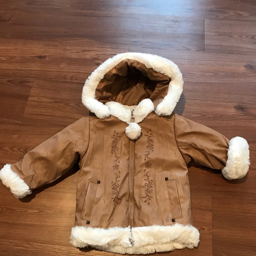 White and brown winter coat